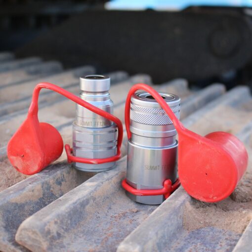 F12-08N-SET Flat Face Quick Coupler Set sitting on construction equipment