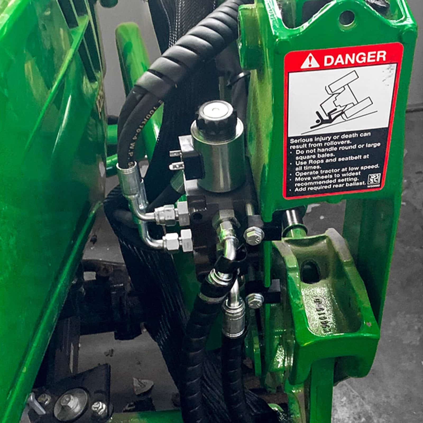 Diverter valve mounted on a John Deere Tractor